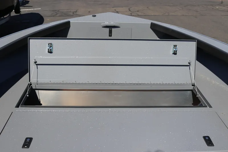 Slide: The Image of 2025 Alumaweld Columbia 23 boat with open storage compartment on deck. - 28