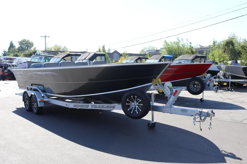Slide: The Image of 2025 Alumaweld Columbia 23 boat on Rogue trailer in outdoor showroom. - 36