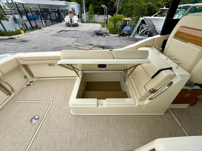 Slide: The Image of 2026 Chris-Craft Calypso 32 with open cockpit storage. - 15