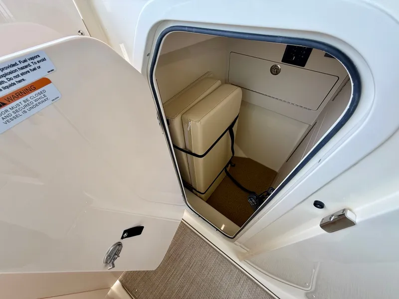 Slide: The Image of Interior of 2026 Chris-Craft Calypso 32 with storage compartment. - 27