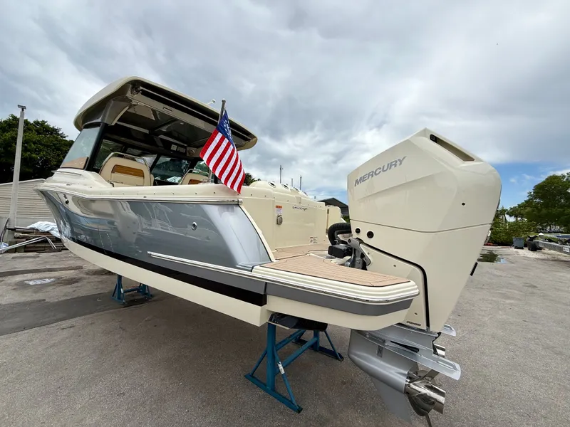 Slide: The Image of 2026 Chris-Craft Calypso 32 boat with Mercury outboard motor. - 29