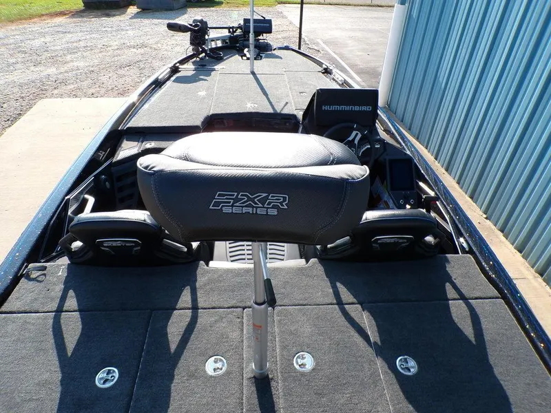 Slide: The Image of 2025 Skeeter FXR20L boat interior with Humminbird electronics and FXR Series seating. - 12
