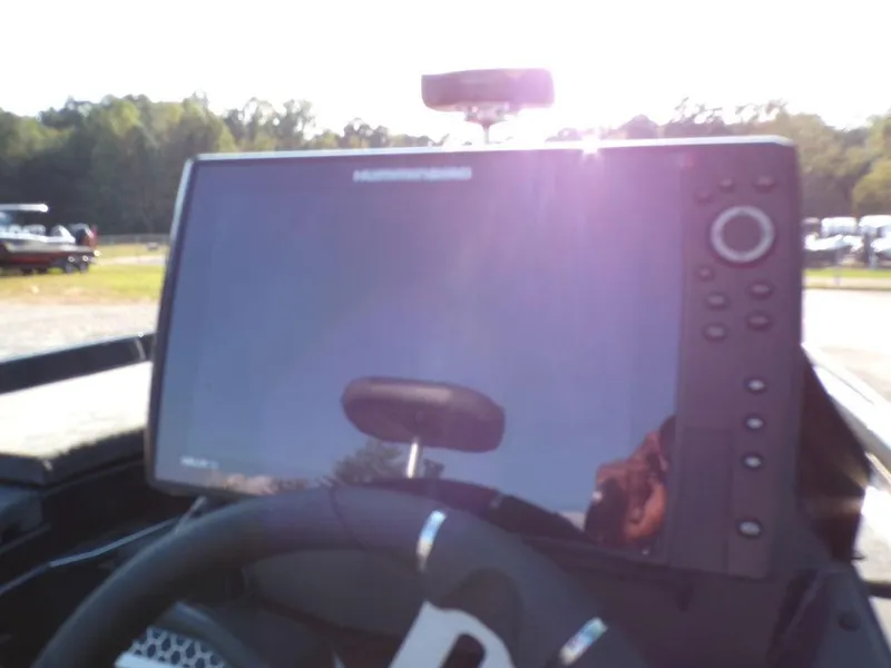 Slide: The Image of 2025 Skeeter FXR20L boat dashboard with advanced navigation display. - 15