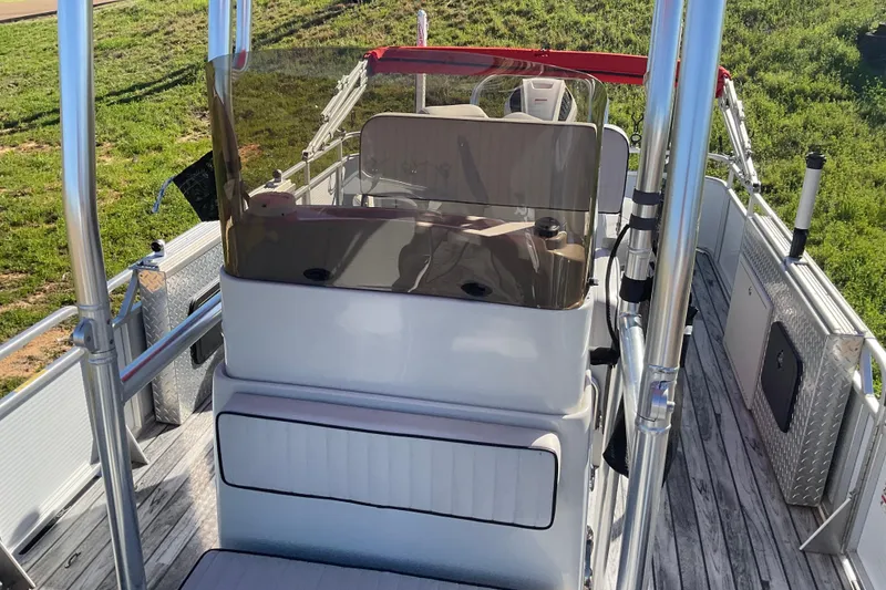 Slide: The Image of 2019 Angler Quest 826 CRAPPIE boat with red canopy and spacious deck. - 3