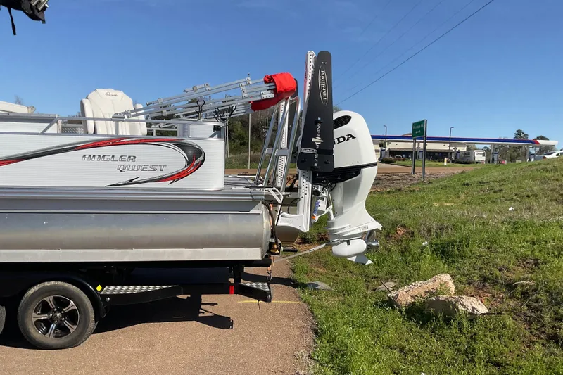 Slide: The Image of 2019 Angler Quest 826 CRAPPIE boat on trailer with Honda outboard motor. - 5
