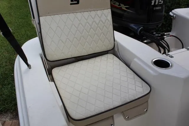 Slide: The Image of 2021 Carolina Skiff 17 LS boat seat with diamond-pattern upholstery. - 11