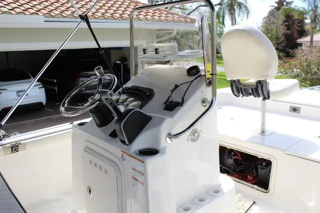 Slide: The Image of 2021 Carolina Skiff 17 LS boat interior with steering console and seating. - 9