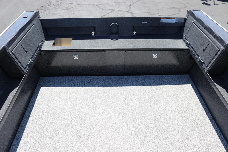 Slide: The Image of 2025 Alumaweld Free Drifter 20 boat interior with spacious deck and storage compartments. - 15