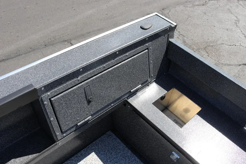 Slide: The Image of 2025 Alumaweld Free Drifter 20 boat interior with storage compartments. - 17