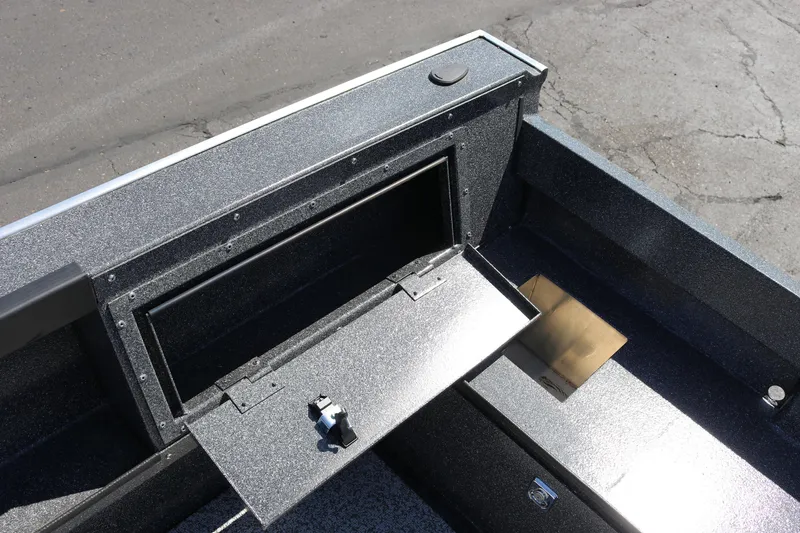 Slide: The Image of 2025 Alumaweld Free Drifter 20 boat storage compartment with open hatch. - 18