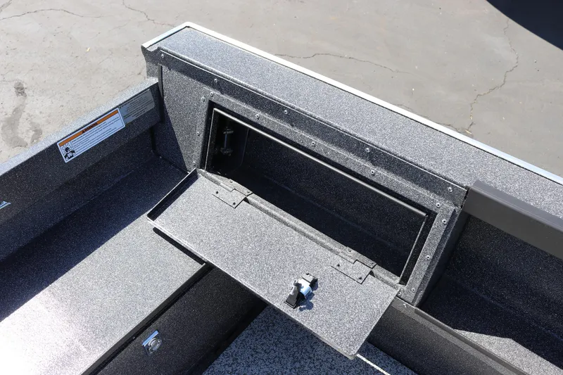 Slide: The Image of 2025 Alumaweld Free Drifter 20 boat storage compartment with open hatch. - 20