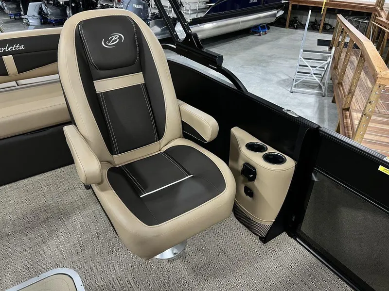 Slide: The Image of Barletta Cabrio C24UC 2025 captain's chair with cup holders and luxury seating. - 22