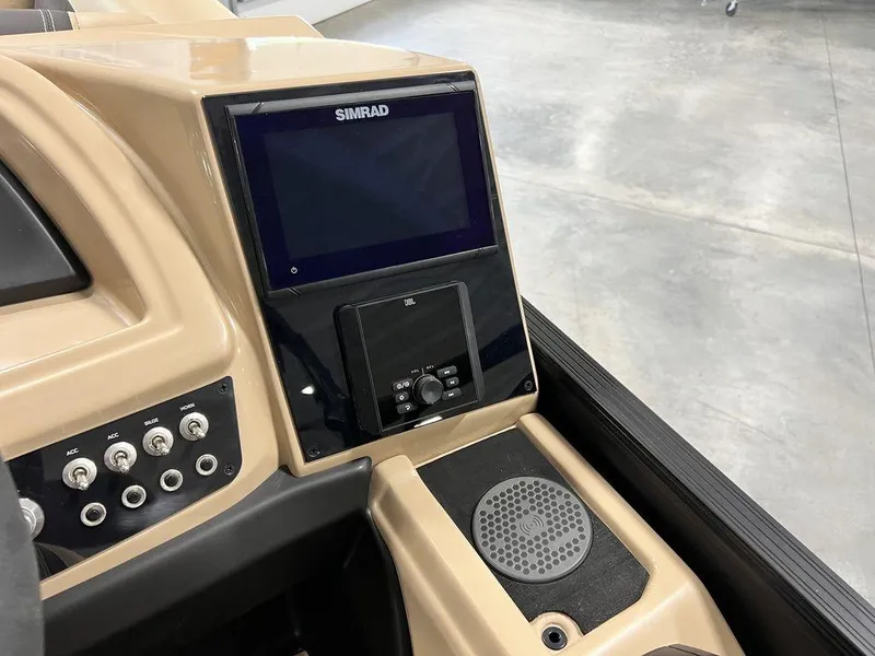 Slide: The Image of Control panel of 2025 Barletta Cabrio C24UC boat with Simrad display. - 24
