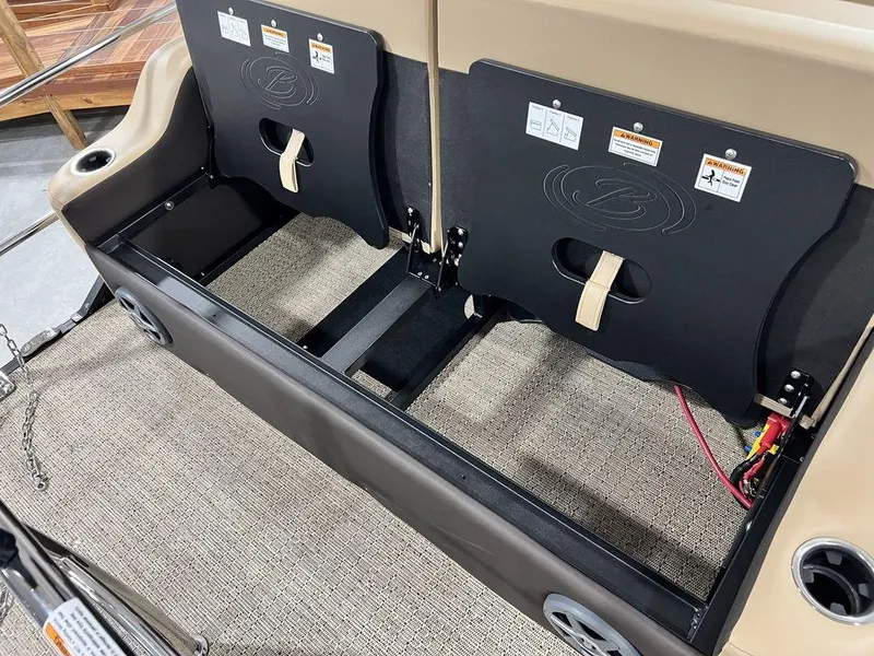 Slide: The Image of 2025 Barletta Cabrio C24UC boat interior storage compartment. - 29