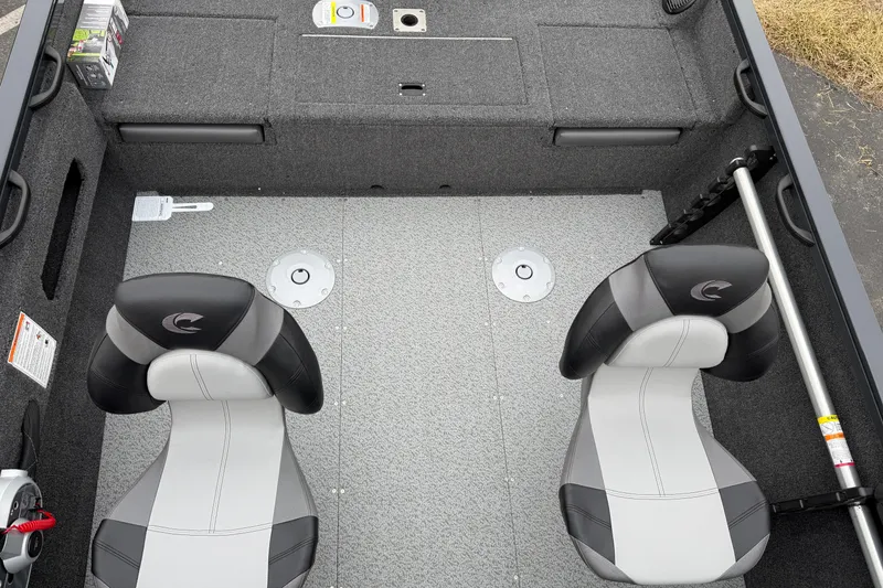 Slide: The Image of Interior of 2026 Crestliner 1750 Hawk boat with two seats and storage compartments. - 12