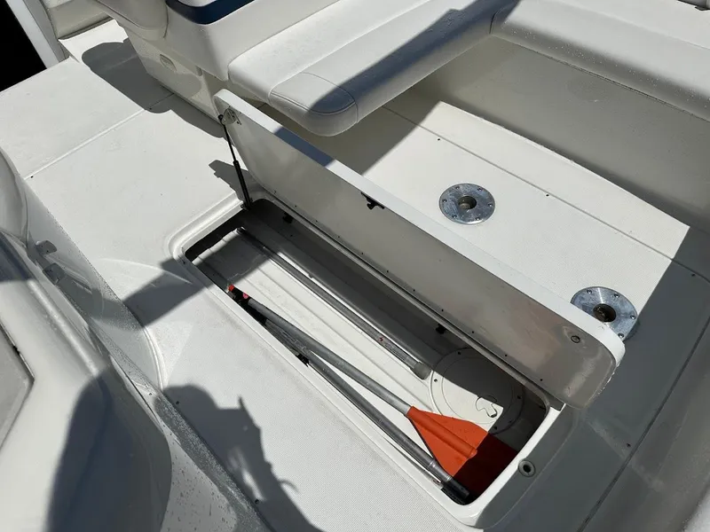 Slide: The Image of Open storage compartment on a 2000 Formula 330 SS boat deck. - 22