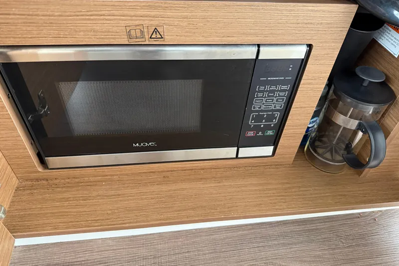 Slide: The Image of Microwave and French press in Jeanneau NC 895 boat kitchen, 2020 model. - 13