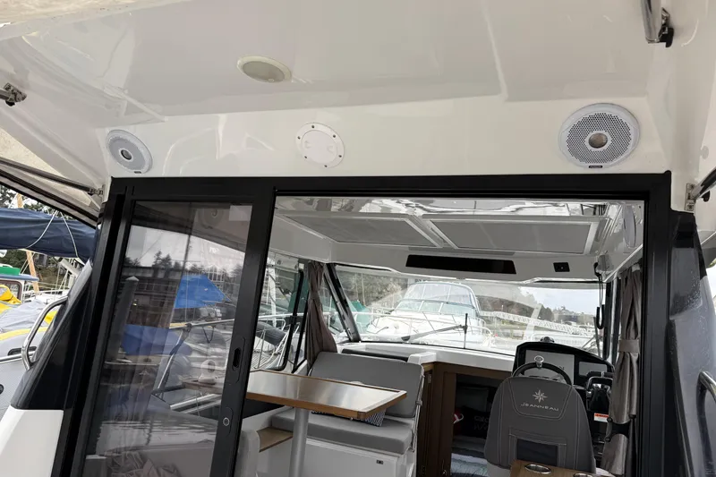 Slide: The Image of Interior view of 2020 Jeanneau NC 895 boat with sliding glass door. - 23