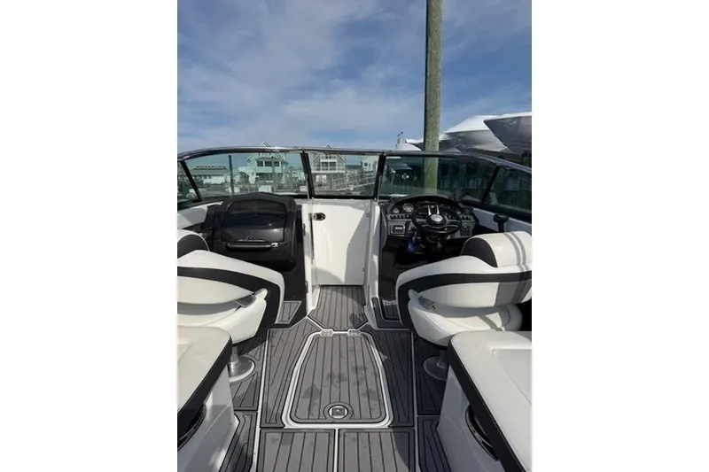 Slide: The Image of Interior view of 2015 Monterey 268SS Super Sport boat with modern seating and dashboard. - 3