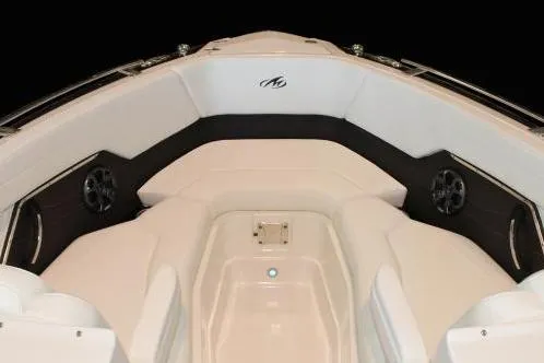 Slide: The Image of Manufacturer Provided Image: 2015 Monterey 268SS Super Sport boat interior with white seating and black accents. - 8
