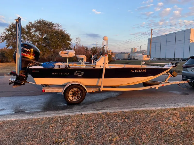 Slide: The Image of 2017 G3 BAY boat on trailer at sunset. - 2
