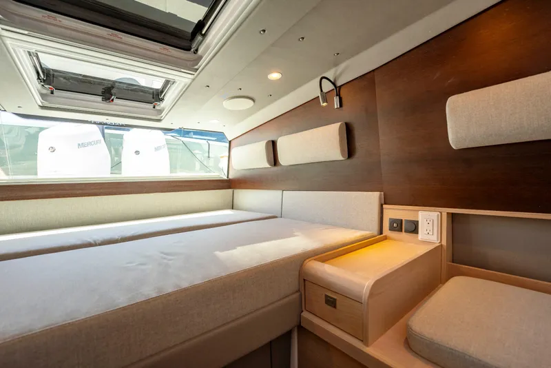 Slide: The Image of Luxurious interior of 2026 Axopar 45 XC Cross Cabin with modern design and comfortable seating. - 32