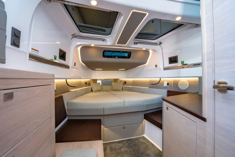 Slide: The Image of Luxurious interior of 2026 Axopar 45 XC Cross Cabin with modern design and ambient lighting. - 31