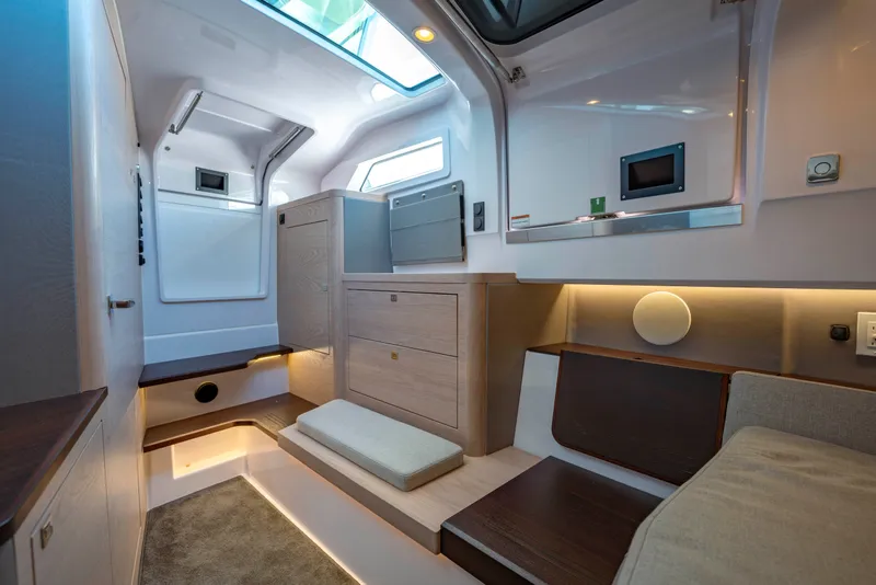 Slide: The Image of Luxurious interior of 2026 Axopar 45 XC Cross Cabin with modern design and ambient lighting. - 33