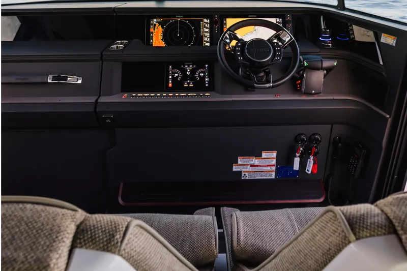 Slide: The Image of Interior of 2026 Axopar 45 XC Cross Cabin with modern helm console. - 7