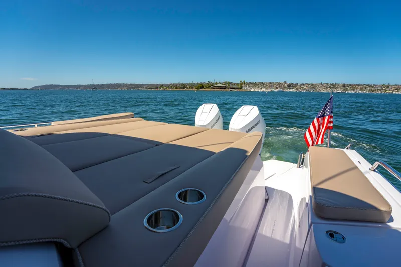 Slide: The Image of Luxurious Axopar 45 XC Cross Cabin boat, 2026 model, cruising on a sunny day. - 15
