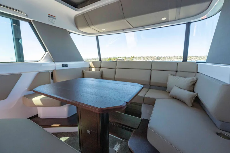 Slide: The Image of Luxurious interior of 2026 Axopar 45 XC Cross Cabin with spacious seating and panoramic windows. - 30
