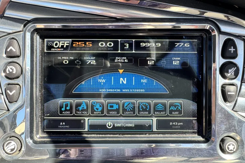 Slide: The Image of Dashboard of a 2015 Tigé Z3 boat displaying navigation and system controls. - 11