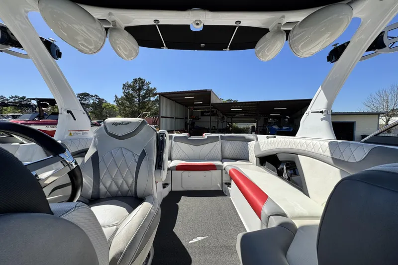 Slide: The Image of 2015 Tigé Z3 boat interior with luxurious seating and modern design. - 15
