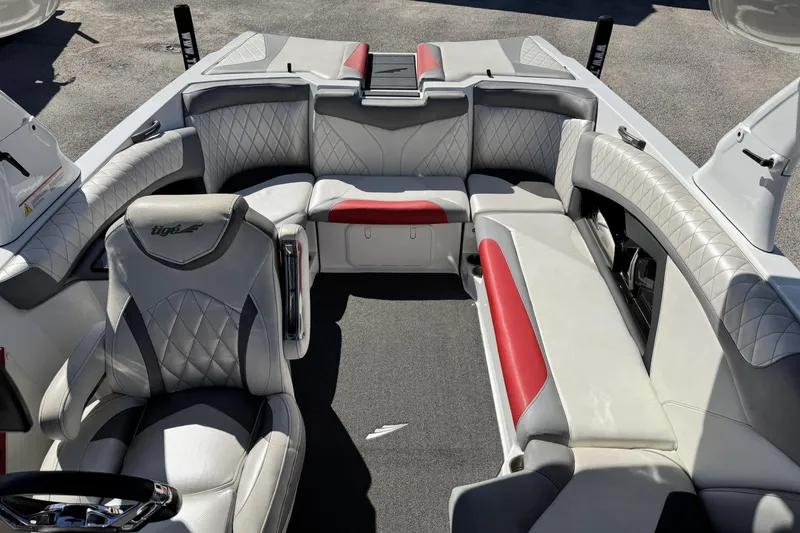 Slide: The Image of Interior of a 2015 Tigé Z3 boat with luxurious seating and modern design. - 16