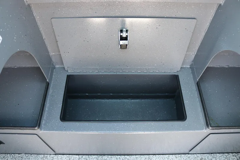 Slide: The Image of 2025 Alumaweld Stryker X202 storage compartment with secure latch and spacious interior. - 12