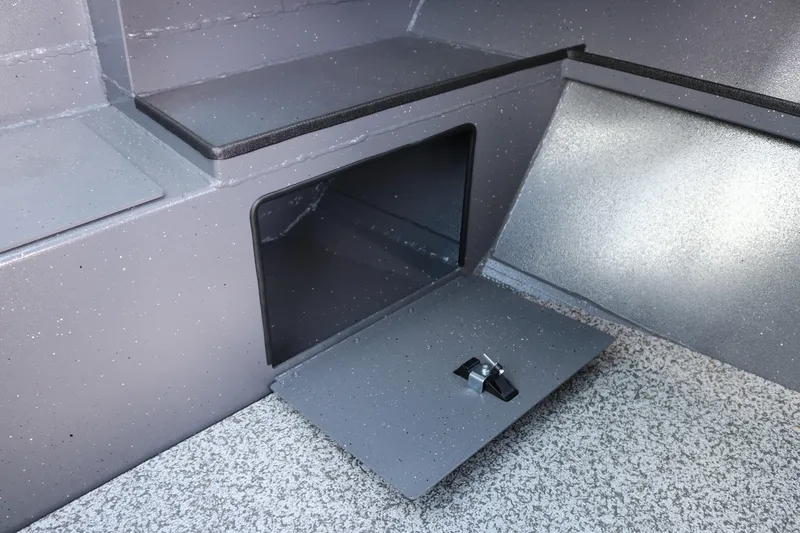 Slide: The Image of Storage compartment in 2025 Alumaweld Stryker X202 boat interior, featuring a secure latch. - 13