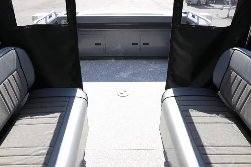 Slide: The Image of Interior view of 2025 Alumaweld Stryker X202 boat with seating and storage. - 19