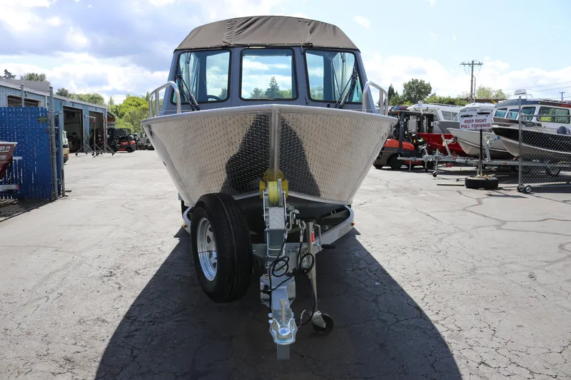 Slide: The Image of 2025 Alumaweld Stryker X202 boat on trailer in outdoor lot. - 6