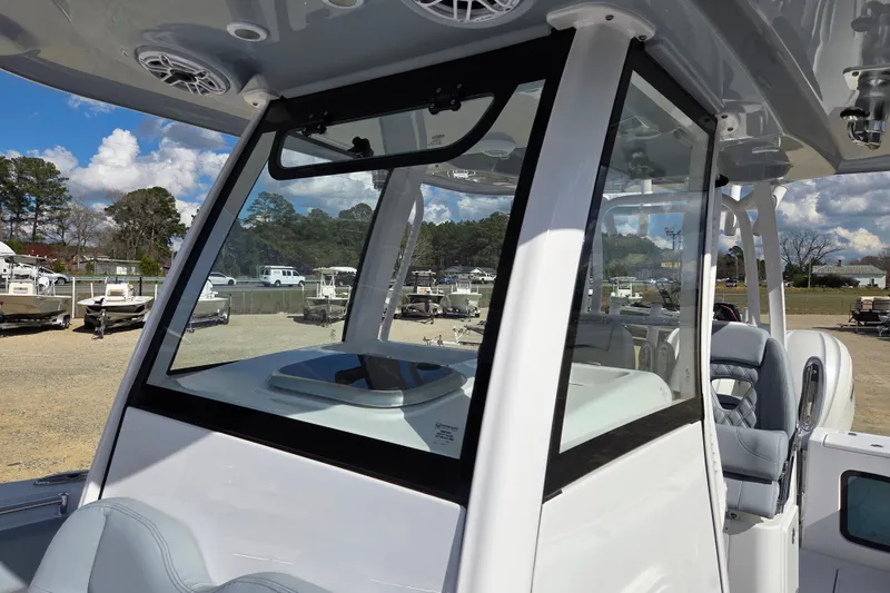 Slide: The Image of 2026 Sportsman Open 282 Center Console boat with sleek design and modern features. - 10