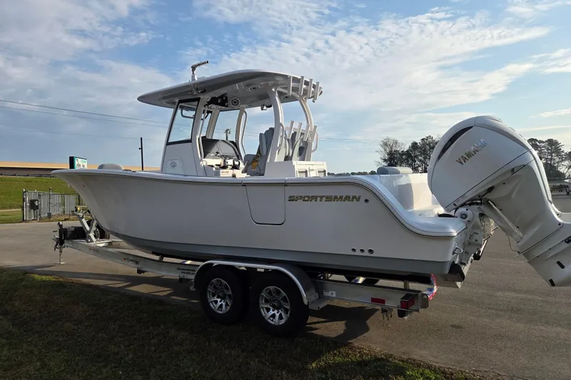 Slide: The Image of 2026 Sportsman Open 282 Center Console boat on trailer, featuring Yamaha outboard motor. - 5