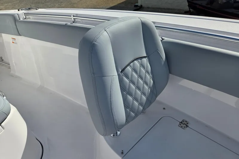 Slide: The Image of 2026 Sportsman Open 282 Center Console boat seat with quilted design. - 8