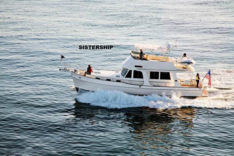 The Image of 2007 Grand Banks 47 Europa yacht cruising on open water. - 1