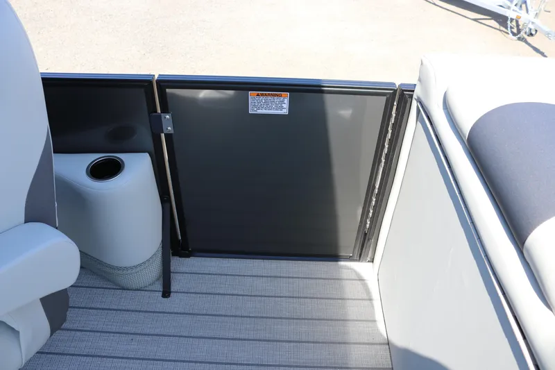 Slide: The Image of Interior of 2025 SunChaser Geneva Sport 23 SB DH with door and cup holder. - 24