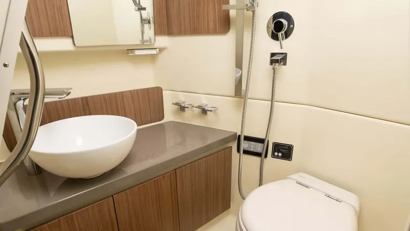 Slide: The Image of Luxurious bathroom in Chris-Craft Calypso 35 boat, model year 2026. - 13