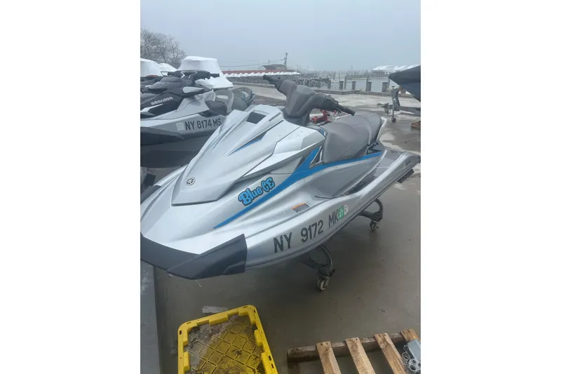 Slide: The Image of 2015 Yamaha WaveRunner VX Deluxe jet ski parked on a dock. - 10