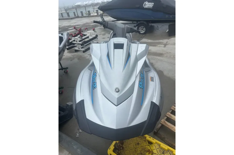 Slide: The Image of 2015 Yamaha WaveRunner VX Deluxe jet ski on a dock. - 11
