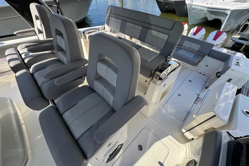 Slide: The Image of 2021 Boston Whaler 420 Outrage interior with luxurious seating and modern design. - 15
