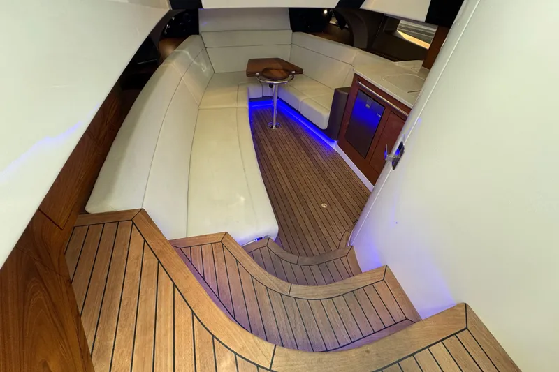 Slide: The Image of Luxurious interior of 2021 Boston Whaler 420 Outrage with elegant wood flooring. - 16