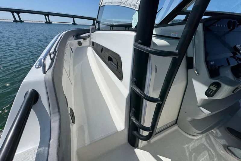 Slide: The Image of 2021 Boston Whaler 420 Outrage boat interior with sleek design and modern features. - 7
