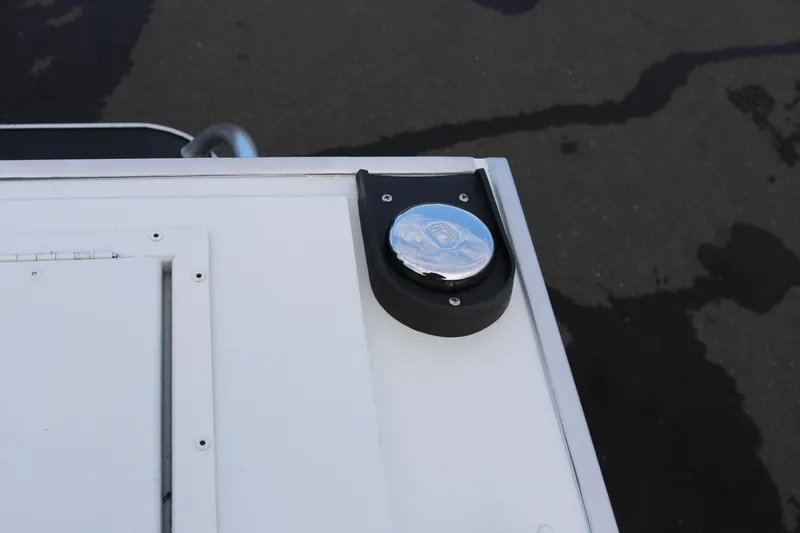 Slide: The Image of 2026 Alumaweld Intruder Outboard 22 interior with cushioned seating and storage compartment. - 11